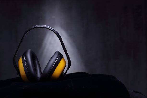 istock Protective Ears industrial for Construction engineer on black velvet cloth 944990552