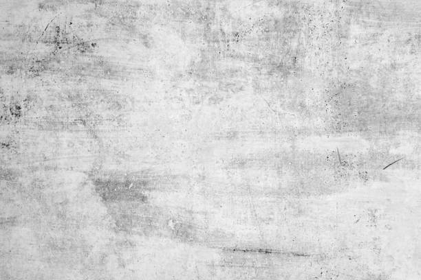 istock Old concrete wall with scuffs of gray color, texture background 945007780