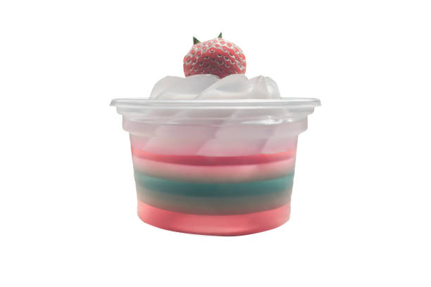 istock isolate rainbow jelly with fresh strawberry  on white background 945008612
