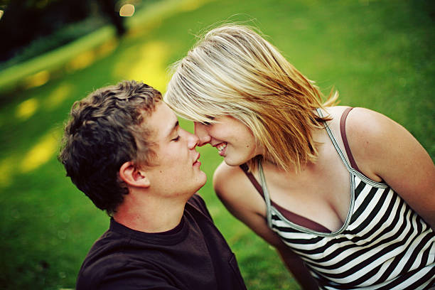 istock Couple Showing PDA in a Public Park 94500876