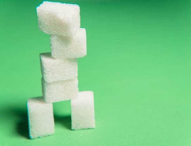 istock Refined sugar. Sugar in the form of cubes 945008908