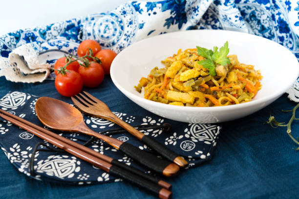 istock asian food fried noodle on the table 945009412