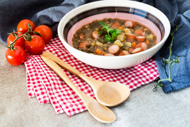 istock Traditional homemade Sausages with beans soup 945012376