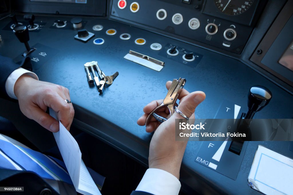 Train driver in cabine The driver's hands in the cab of the train Driver - Occupation Stock Photo