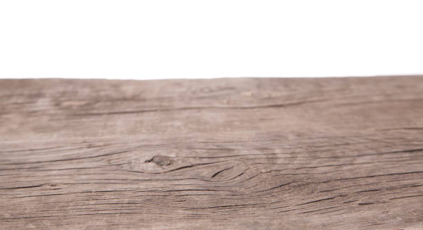 istock Wooden old table top isolated on white background. Copy space for text 945017626