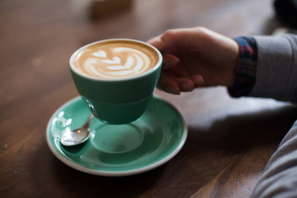 istock Art latte a cup of hot coffee 945017670