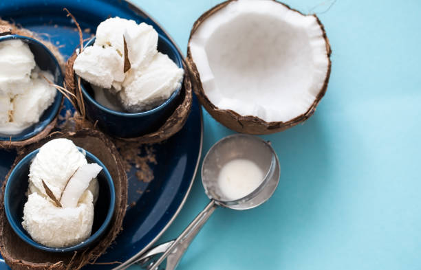istock coconut ice cream on a blue background 945023452