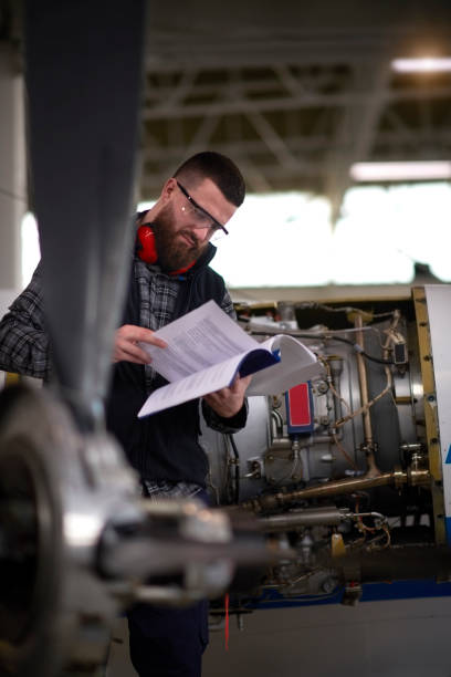 istock Aircraft mechanic in the hangar 945026066