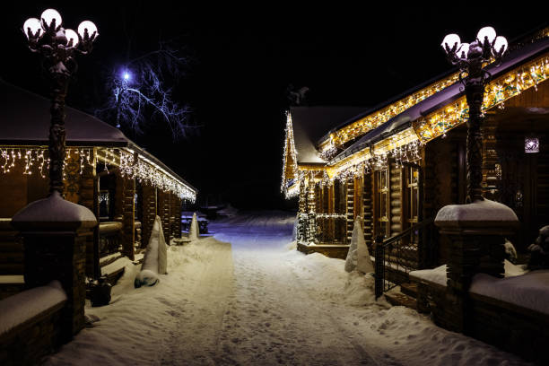 istock Christmas fantasy cottage lights 945026252