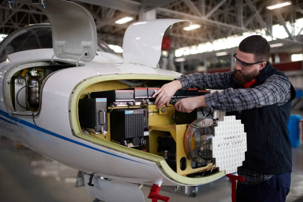 istock Aircraft mechanic in the hangar 945026424