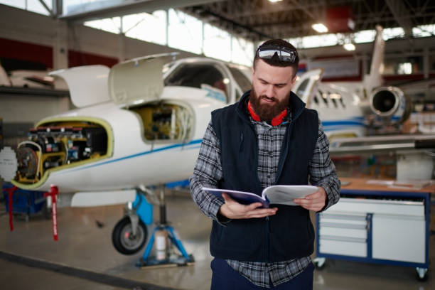 istock Aircraft mechanic in the hangar 945026564