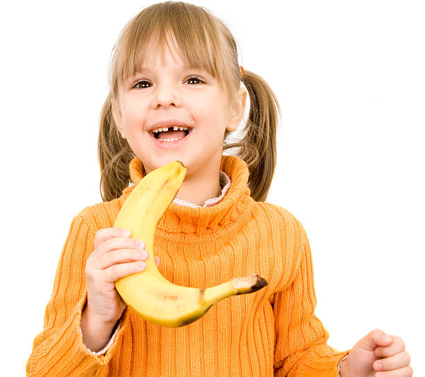 istock girl with banana 94502745