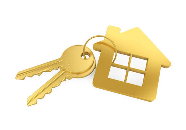 istock Golden House Key Isolated 945033802