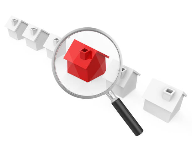 istock Houses with Magnifying Glass Isolated (House Hunting Concept) 945036836