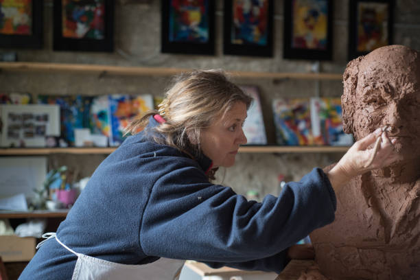 istock Portrait of a sculptor in her workshop, Provence 945037774