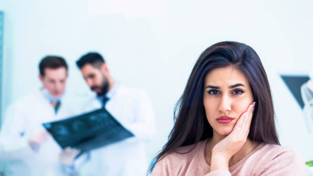 istock Young woman with toothache 945041150
