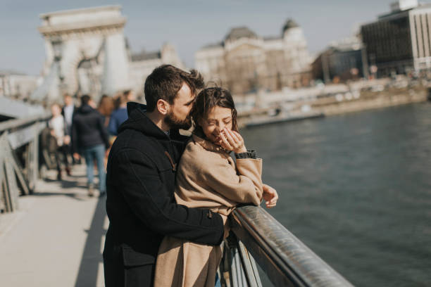 istock Loving couple on Chain bridge, Budapest 945042108