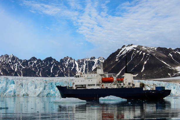 Expedition vessel in Arctic sea stock photo