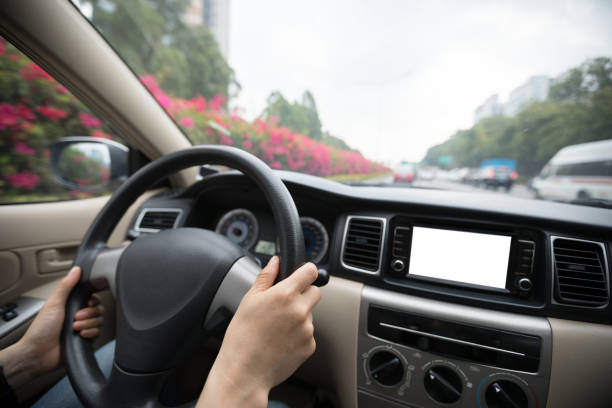istock driving car on city street use gps navigation 945052662