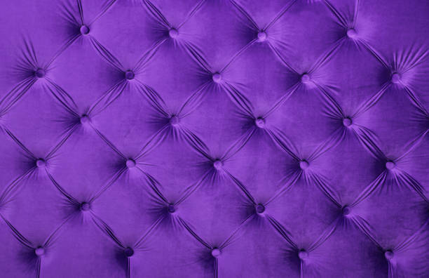 polsterung stoff violett capitone getuftet - leather headboard stock-fotos und bilder