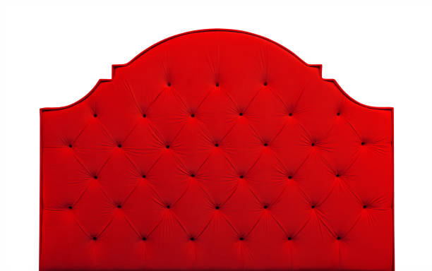Red velvet bed headboard isolated on white