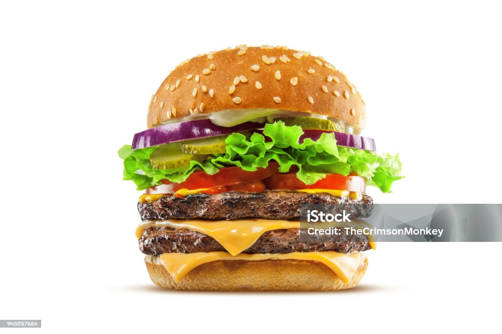 Double Cheese Burger High resolution, digital capture of a big, fat, juicy double cheeseburger. Made with two 100% beef patties, two melty slices of cheese, lettuce, tomatoes, onion, and pickles, on a fresh sesame seed bun, and set against a clean, white background sweep. Shot in an aspirational advertising style. Burger Stock Photo