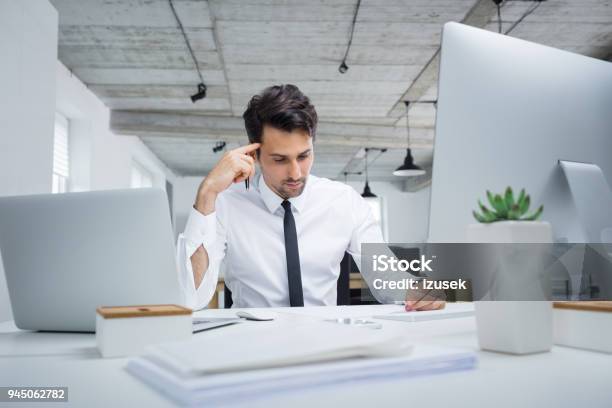 Young Businessman Working In Office Stock Photo - Download Image Now - 25-29 Years, Adult, Adults Only