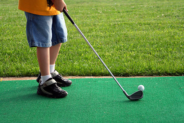 Little golfista - foto de stock