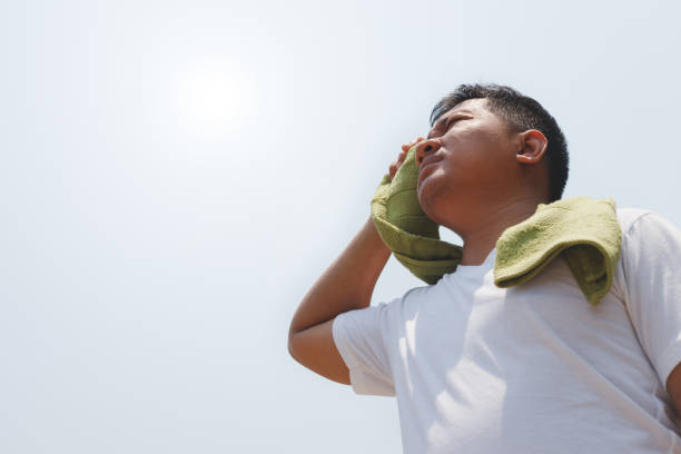 istock Young man and heat stroke. 945079276