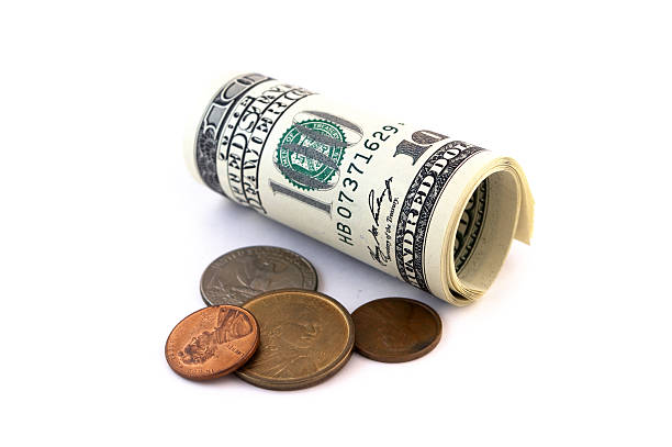 istock Banknotes and coins isolated on white 94508198