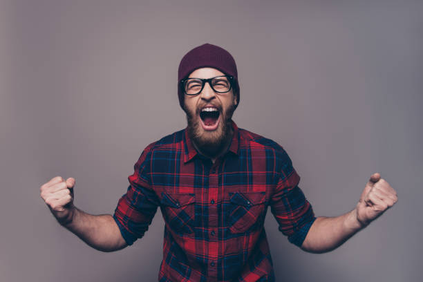 istock Depressed angry hipster bearded man yelling and screaming 945082366