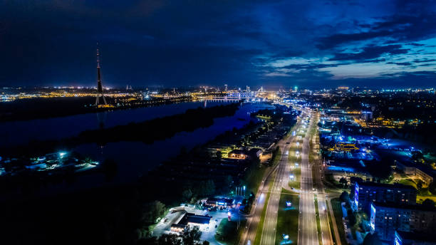 istock Riga city Night time bridge Autumn Drone flight 945085600