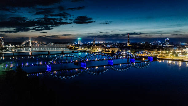 istock Riga city Night time bridge Autumn Drone flight 945085808