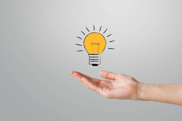 istock Woman hand open hand holding vector bulb  light illustration 945093542