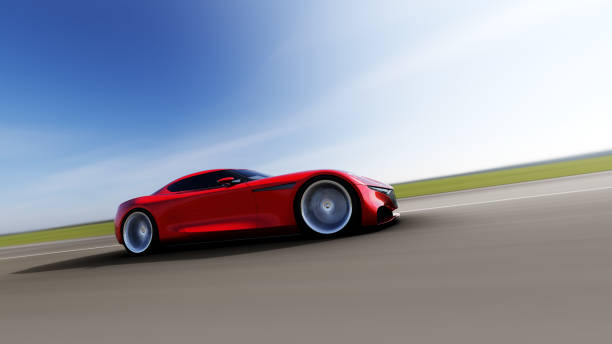 istock red car driving on a road 945094840