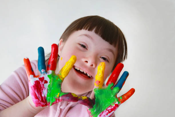 istock Cute little girl with painted hands 945097570