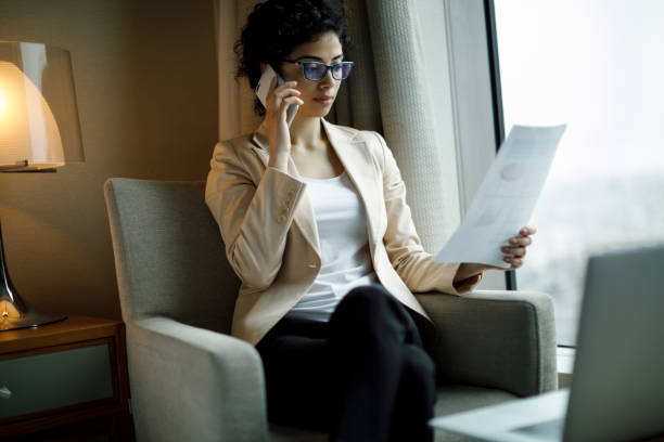 istock Businesswoman working in a hotel room 945105920