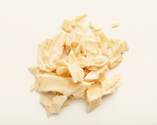 manteiga de cacau, isolada no branco - cocoa butter - fotografias e filmes do acervo