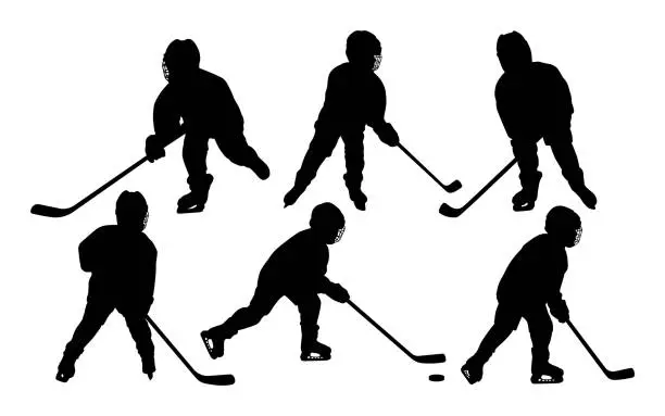 Vector illustration of Youth Hockey Player Silhouettes