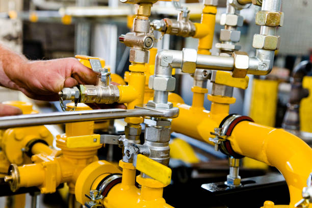istock Yellow Gas pipes and measuring tool pressue 945113508