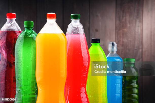 Plastic Bottles Of Assorted Carbonated Soft Drinks Stock Photo - Download Image Now - Drink, Sugar - Food, Soda