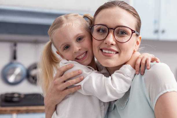 istock Pretty nice mother and daughter embracing 945121006