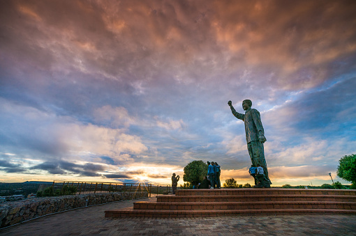 Mandela Statue, Naval Hill, Bloemfontein - 30 March, 2018 : The six and a half meter tall bronze statue  of Nelson Mandela created by Kobus Hattingh and unveiled on 7 December 2012 on the top of Naval Hill in Bloemfontein looking towards Waaihoek where the African National Congress political party was founded, Free State, South Africa