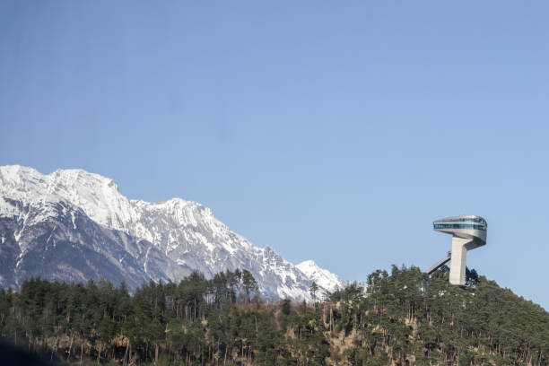 View of the Bergisel ski jump near Innsbruck. In the background the mountains of the Nordkette.