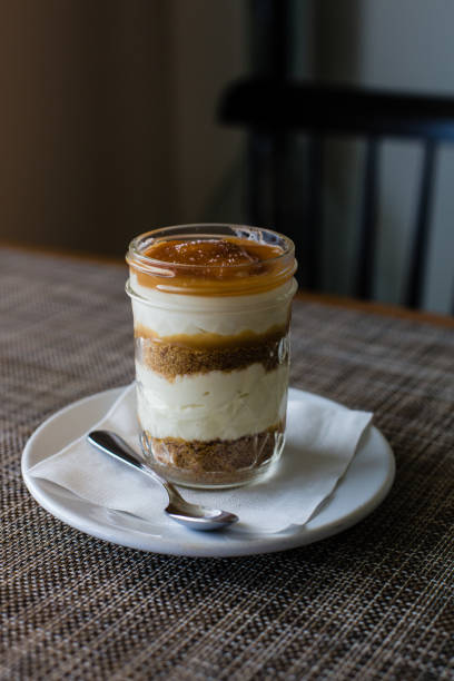 istock Salted caramel cheesecake in a mason jar 945125778