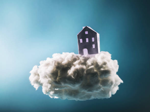istock Paper house standing on the cotton cloud 945129332