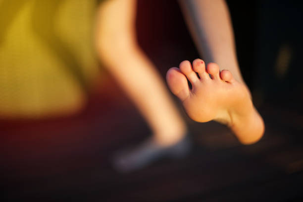 Selective focus of a 9 year old boy's bare foot with blisters on his toes Klein Karoo Oudtshoorn South Africa