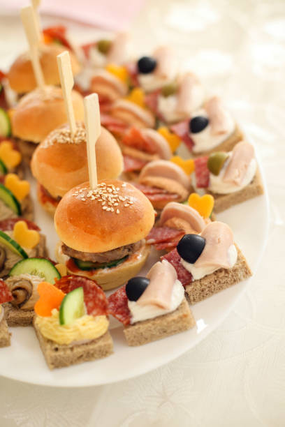 istock Mini burgers and canapes 945132342