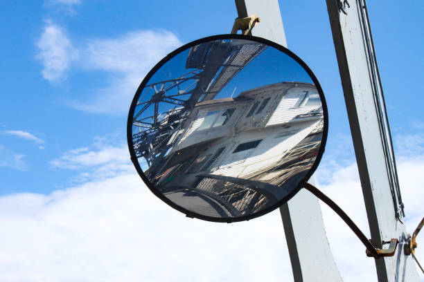 istock Reflection in curved mirror mounted on draw bridge in Mystic Conneticut 945132802