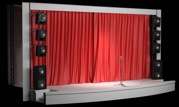 istock Variety with a red curtain and a microphone on the counter 945135310